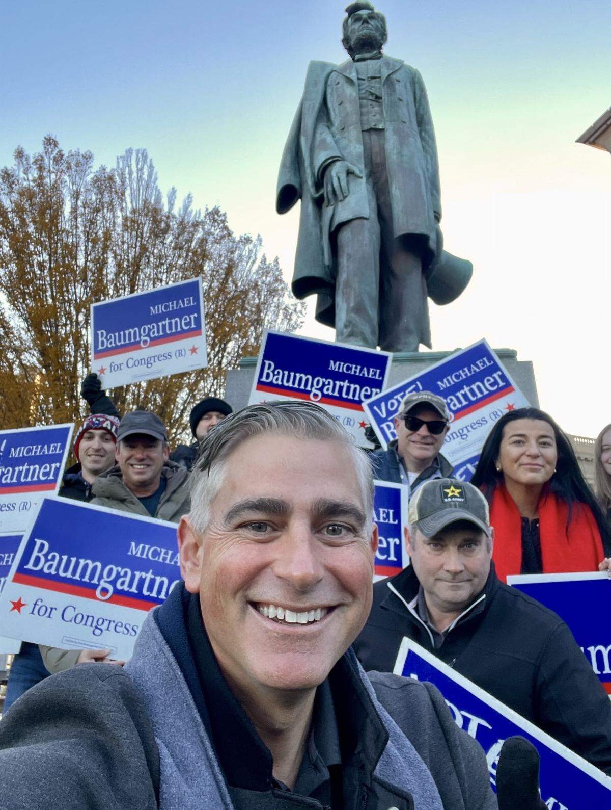 Spokane County Treasurer MIchael Baumgartner is shown campaigning in Riverfront Park in Spokane in April as the Republican candidate for the 5th Congressional District.