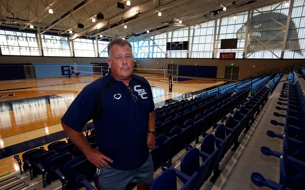 Athletic director Scott Rogers stands in the main competition gymnasium of the new 80,000-square-foot student recreation center at Columbia Basin College in Pasco. A ribbon-cutting ceremony for the new facility is scheduled for Sept. 22.