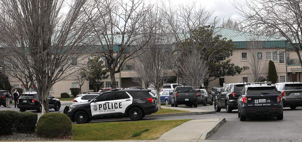 Police search for a wanted person wanted at a Richland business park Wednesday afternoon. The standoff started about noon at the complex near the corner of Comstock Street and George Washington Way.