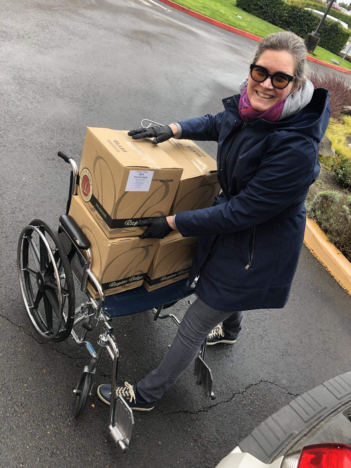 Annie Shull, co-owner and chief operations officer for Raptor Ridge Winery in Newberg, Ore., delivers a donation of wines produced by her husband, Scott, to a Willamette Valley hospital as part of #WinesForTheFrontlines.