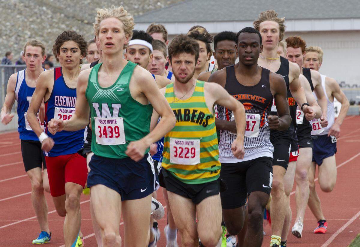 Athletes compete in the boys 1600 meter run during the 58th Pasco invite track and field meet on Saturday at Edgar Brown Stadium.