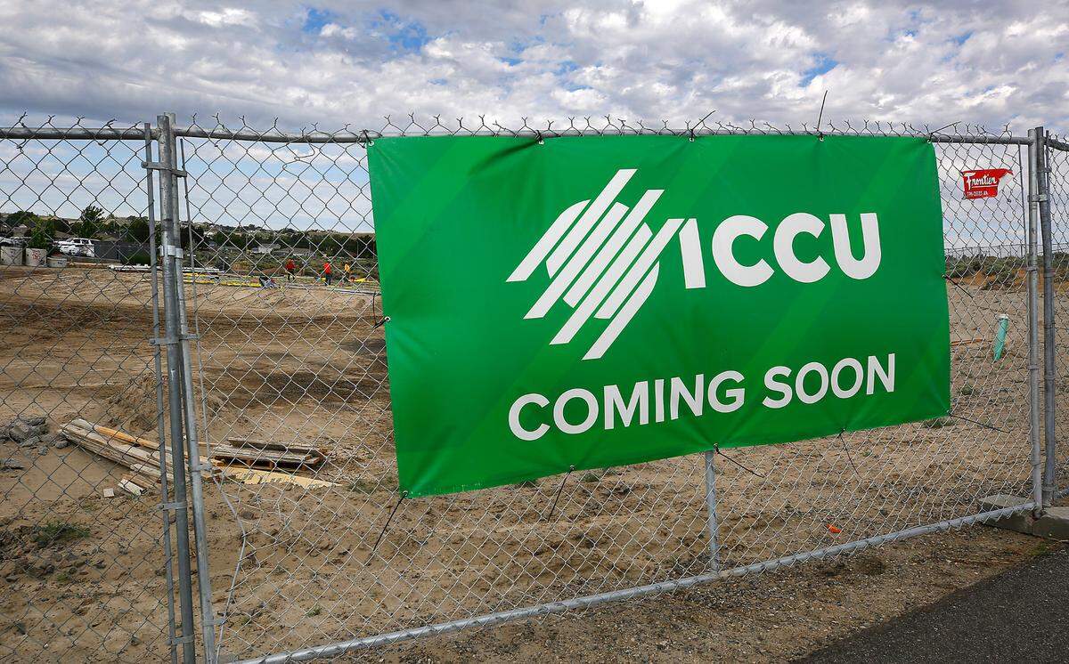 Construction crews work behind fencing preparing to pour the concrete slab for the new Idaho Central Credit Union at 3180 Duportail St. in Richland. It’s one of three ICCU is constructing as it prepares to enter the Tri-Cities market in late 2025. The 5,000-square-foot building will cost about $5.2 million.