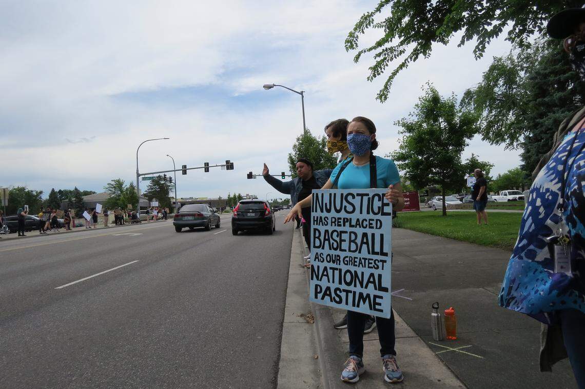 People gathered along George Washington Way on Saturday to call for justice for George Floyd.