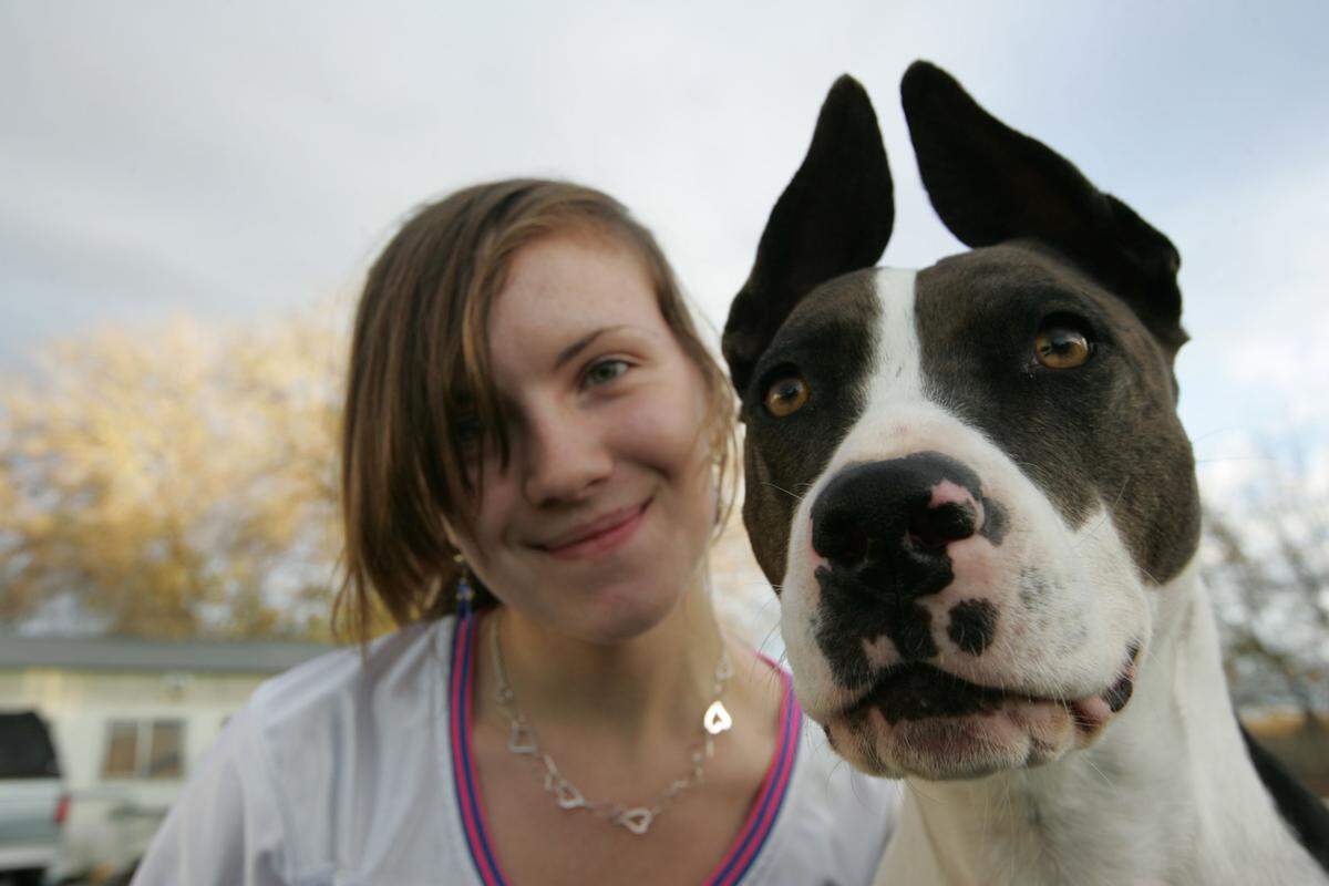 JuliAnna Munden of Pasco and her dog Hype when she was 16. They were heading to Orlando, Fla., where they will compete in the American Kennel Club Juniors Agility Competition.