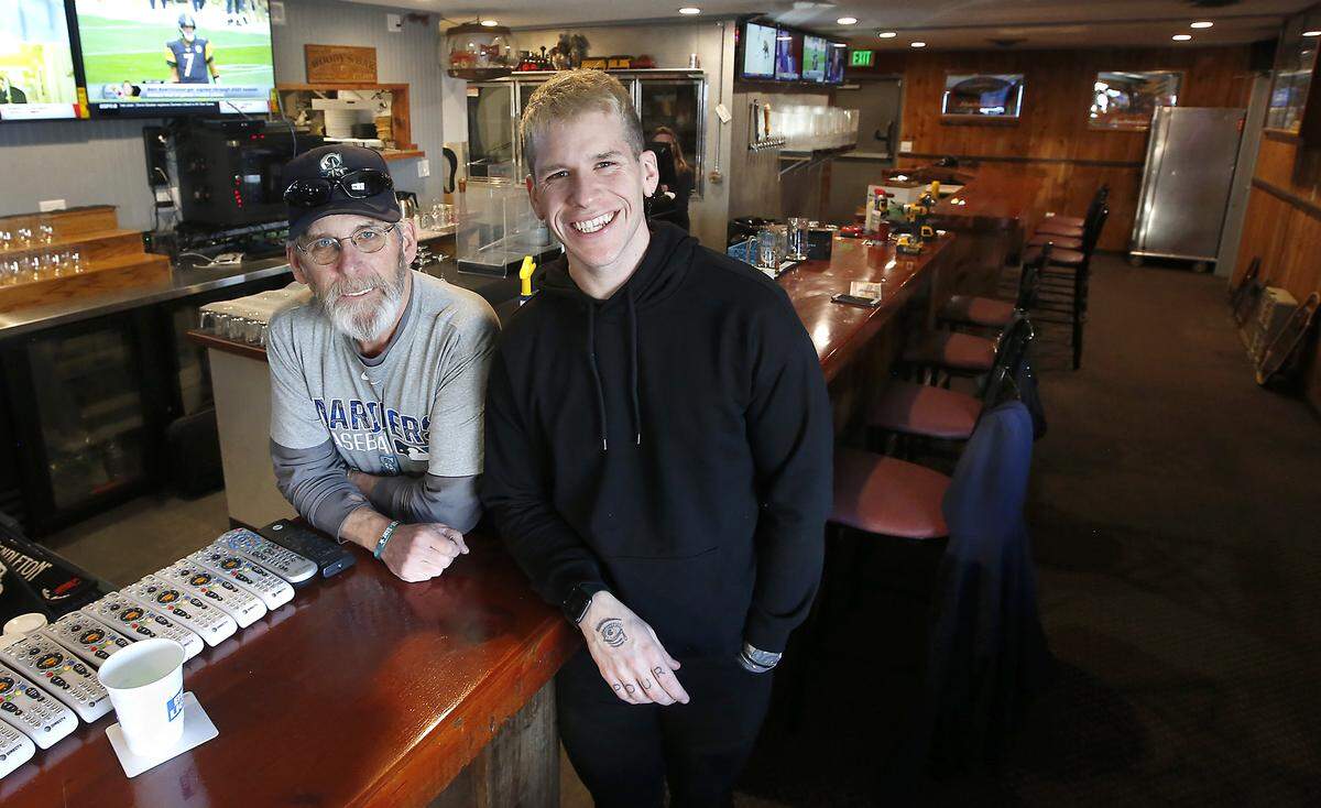 Dwayne “Woody” Woodard, left, and his son, Jackson, have been busy remodeling the former Billy’s Bullpen Tavern on West Clearwater Avenue in Kennewick. They are reopening as Woody’s Bullpen Bar & Grille. Watch a video at: tricityherald.com/videos