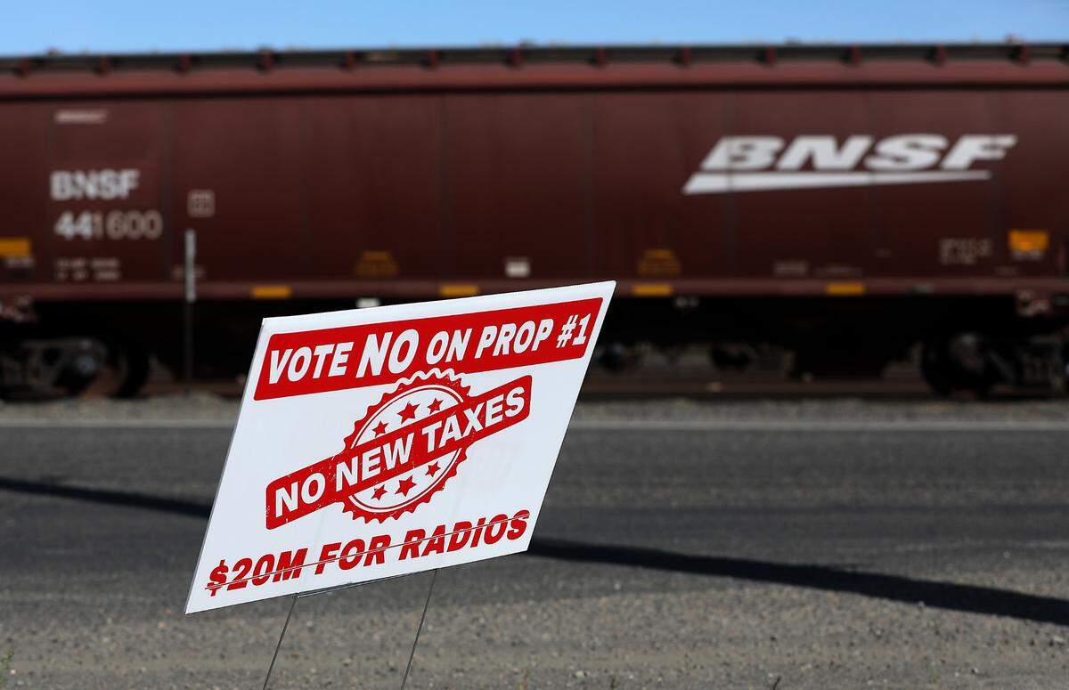 A sign with a message opposing Franklin County Proposition 1, a sales tax for emergency transmission upgrades, is posted on North Fourth Avenue in Pasco.