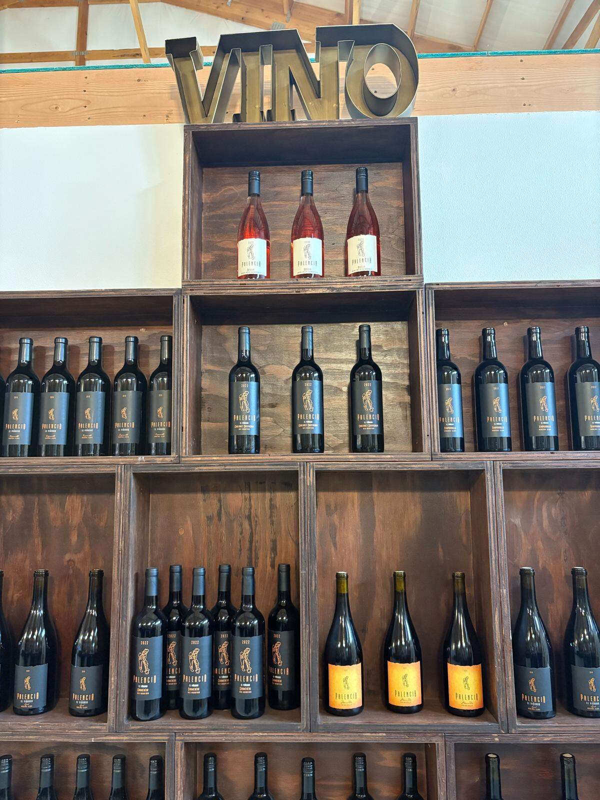 Wine bottles on display in the tasting room at Palencia Estate in Benton City.