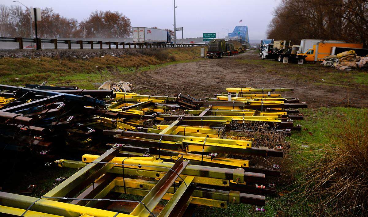 Equipment and supplies are staged on the Pasco side of the blue bridge for the upcoming $33.5 million painting project.