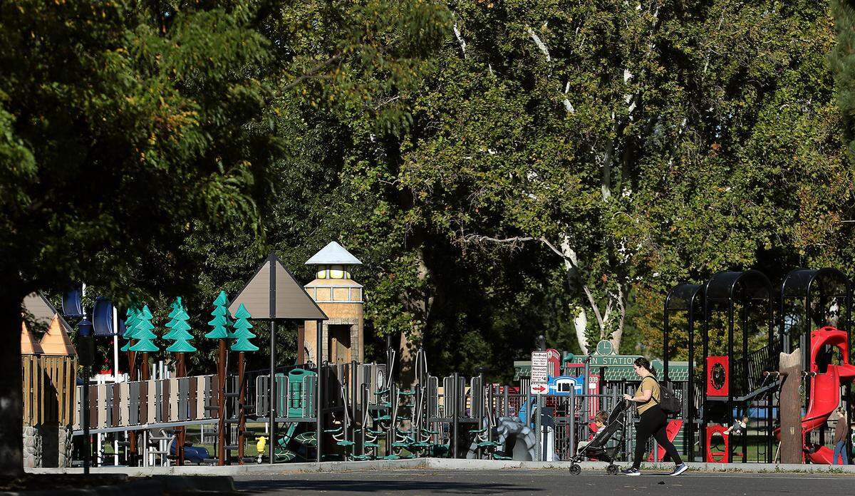 Visitors make their way to the Playground of Dreams in the east end Columbia Park in Kennewick.