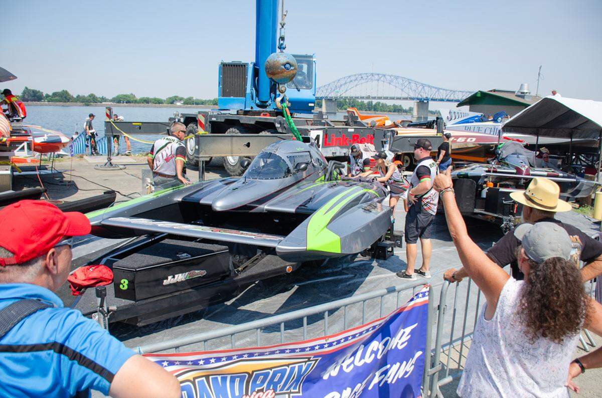 Crews lower a hydroplane Friday afternoon at the 2024 Water Follies Apollo Columbia Cup in Kennewick, Washington.