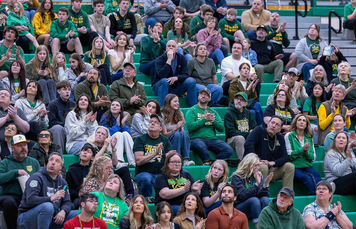 Parents, family and friends join Wednesday night’s pep rally celebrating recent Richland Bombers athletes' Washington state championships. 