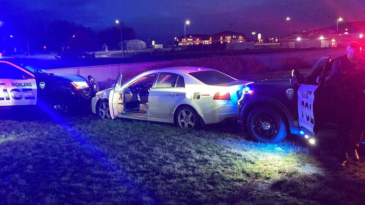 Richland police arrested a woman after she refused to get out of a stolen car at a storage facility near Queensgate Drive.