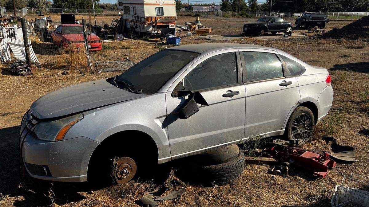 Law enforcement and code enforcement have been called out to an Old Inland Empire Highway home near Prosser dozens of times over several years for aggressive dogs, stolen cars and broken down RVs.