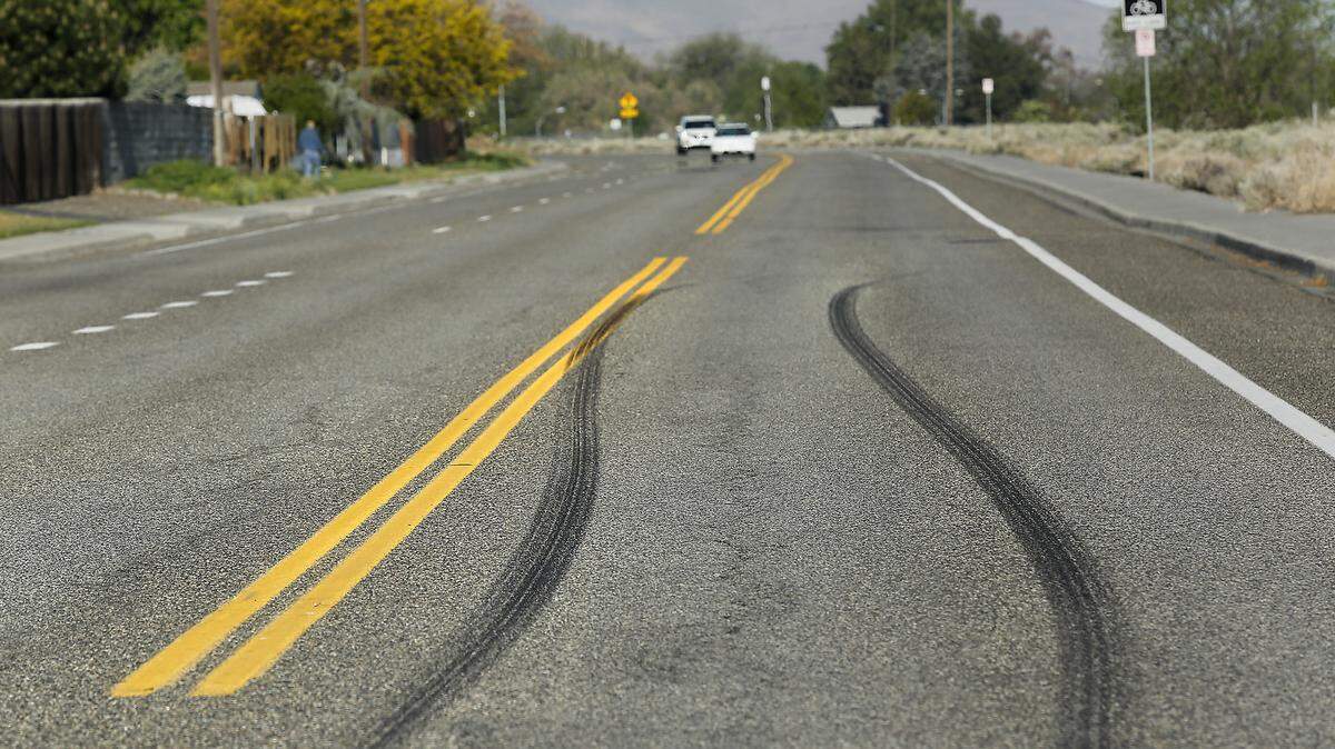Tire burnouts mark the pavement in Kennewick where street racing incidents have been reported in the past.