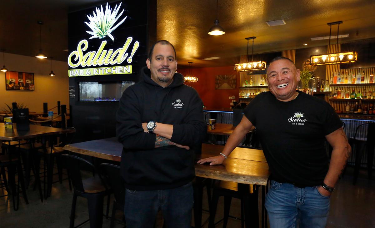 Jesse Martinez, left, and Carmel Perez will celebrate the grand reopening of Salud! Bar and Kitchen at the Riverfront Hotel on Dec. 5.