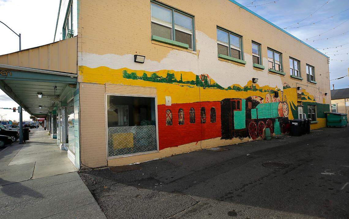 A mural with a railroad theme started by artist Cameron Milton is coming to life on this brick wall in downtown Pasco.