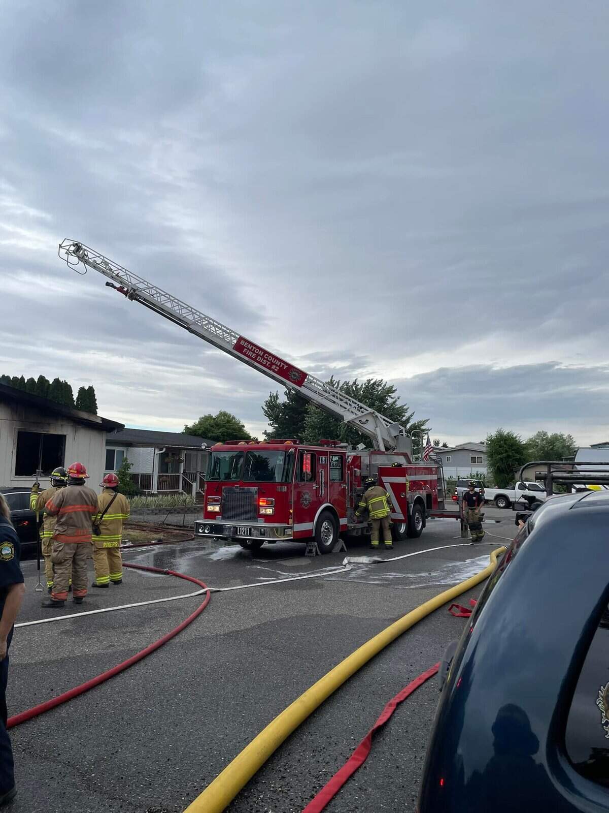 Fire destroyed a manufactured home in West Richland the morning of July 4. Two adults were injured and taken to a hospital.