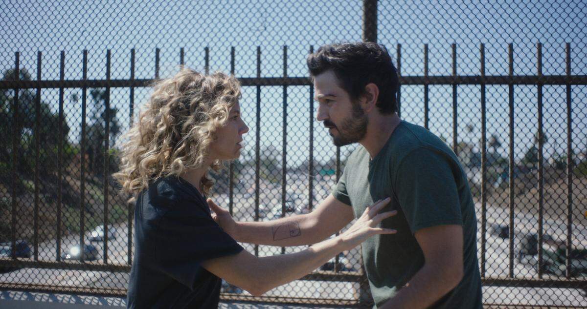 Sienna Miller (”Adrienne”, Left) and Diego Luna (”Matteo”, Right) in “Wander Darkly.”
