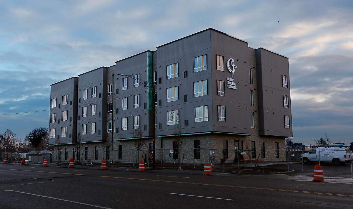The four-story Bishop Skylstad Commons building in Pasco combines affordable, permanent housing with on-site support services to address the needs of those experiencing chronic homelessness.