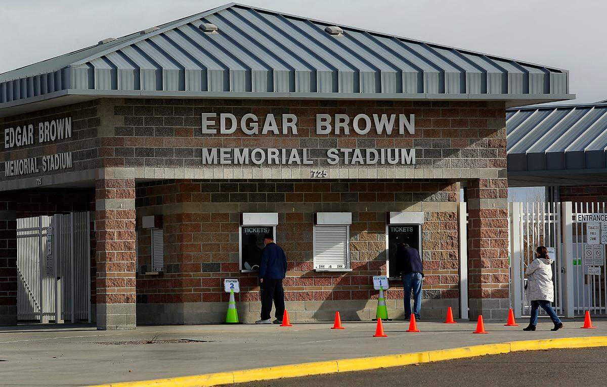 Several people line up Wednesday morning at the Pasco School District’s COVID test site recently set up in the ticket booth at Edgar Brown Memorial Stadium for exclusive testing of students and staff. No appointment is necessary, however, those under 18 must be accompanied by a parent or guardian to be tested, according to a school district email.