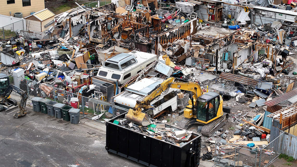 City digs in at Richland 'junkyard’ house. Owner makes plea to save items