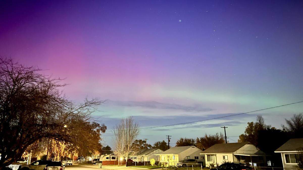 April Muller took this photo of the northern lights as seen from her central Richland home Tuesday.