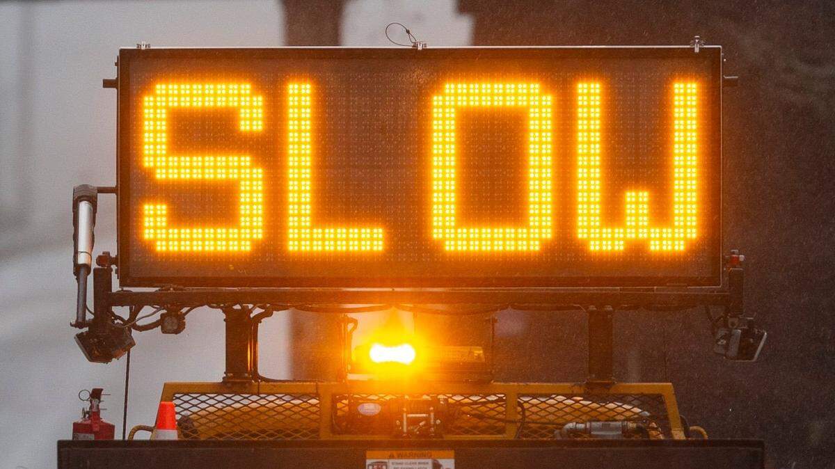 A sign along Highway 126 east of Florence encourages drives to slow down.

RGPlaceHolder Slow sign