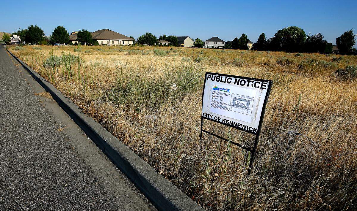 A city of Kennewick notice marks the site of a large new commercial development planned off 24th Avenue in south Kennewick.