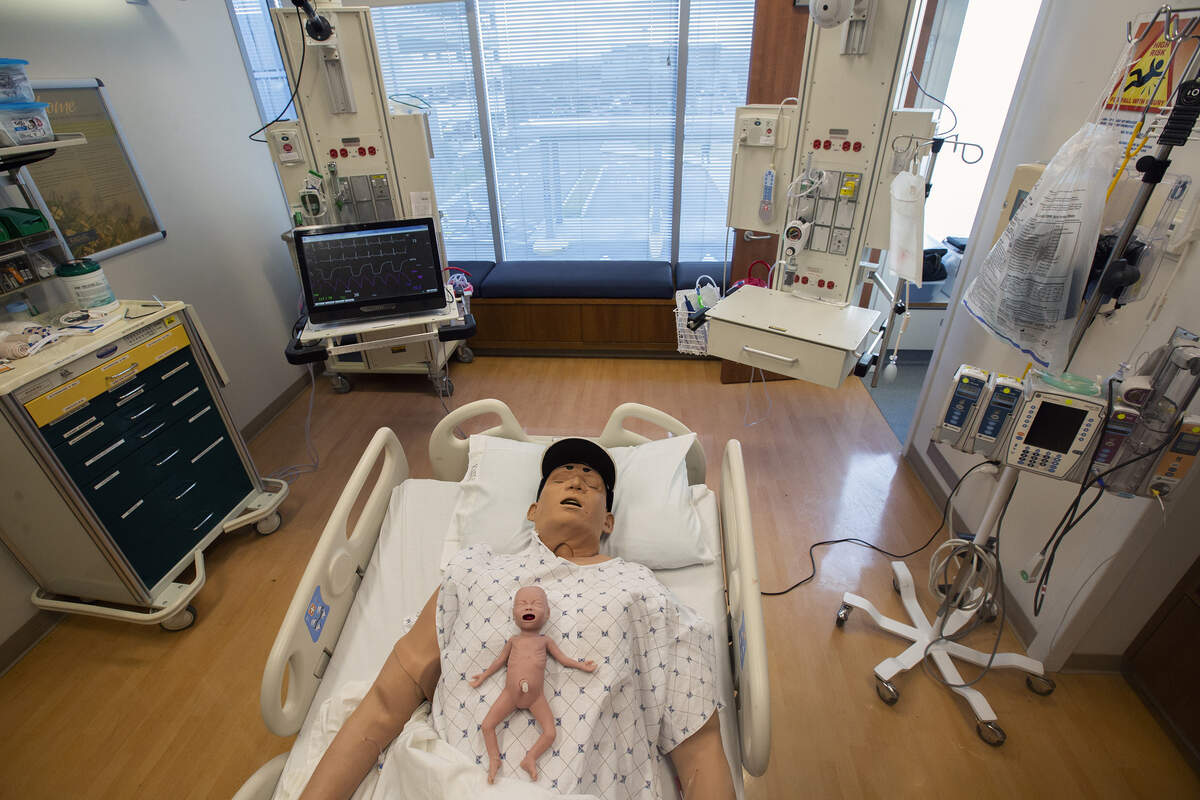 Stan the human-simulator and a 25-week preemie baby simulator are used in a lab at Kadlec Regional Medical Center to train employees for real patients.