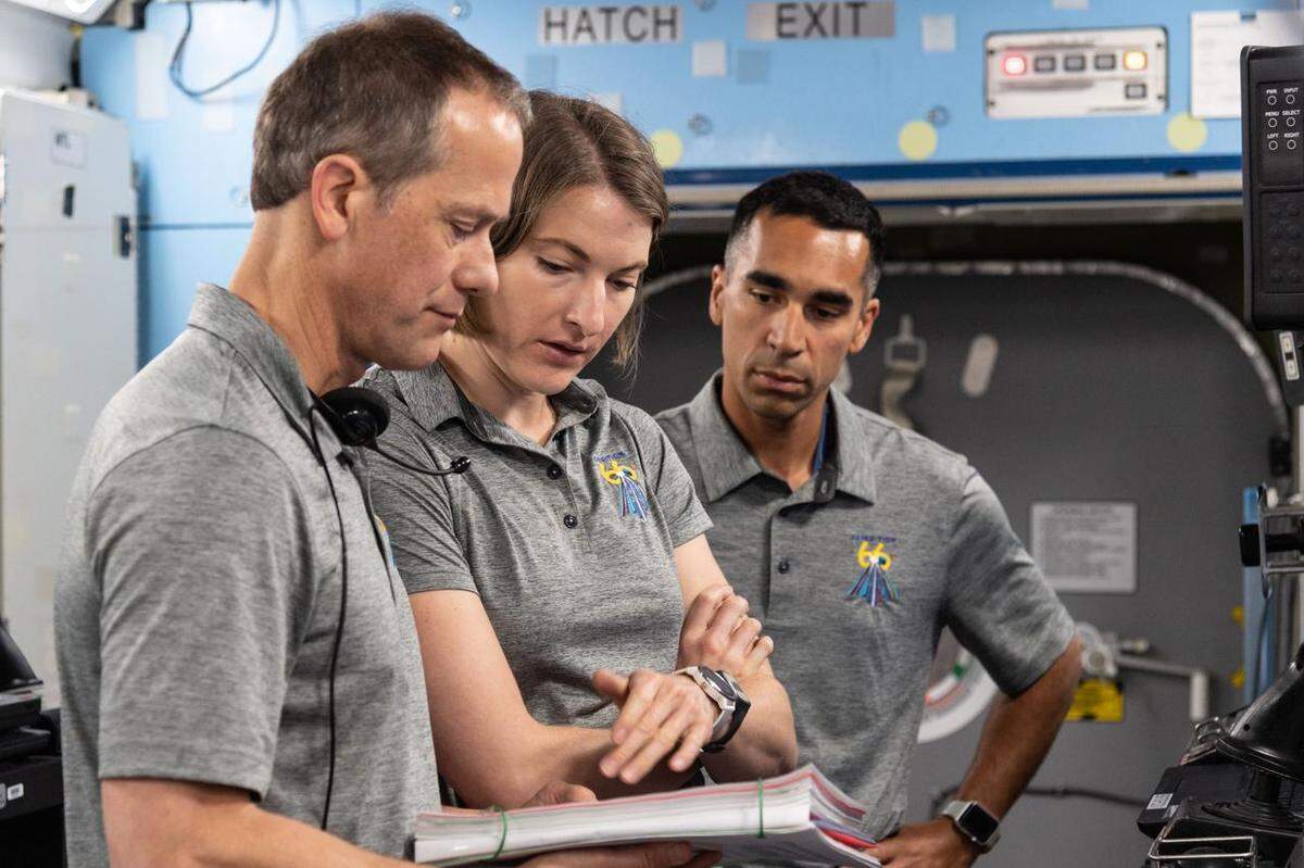 NASA astronauts, from left, Tom Marshburn, Kayla Barron and Raja Chari prepare for their time aboard the International Space Station.