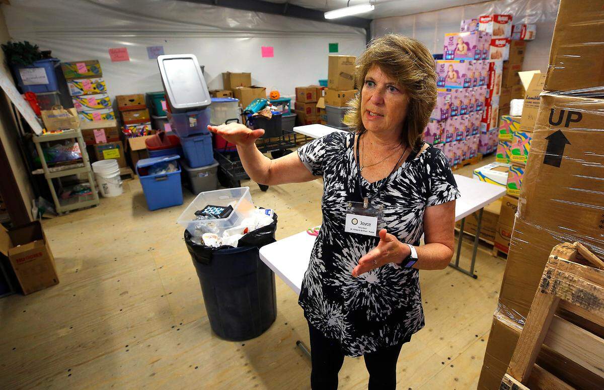 Joyce Gilbert, charitable giving manager at St. Vincent de Paul Food Bank in Pasco, talks about how demand has risen in recent years. They’re distributing more than 100,000 pounds of food each week, despite only being open for a few hours on Wednesdays.