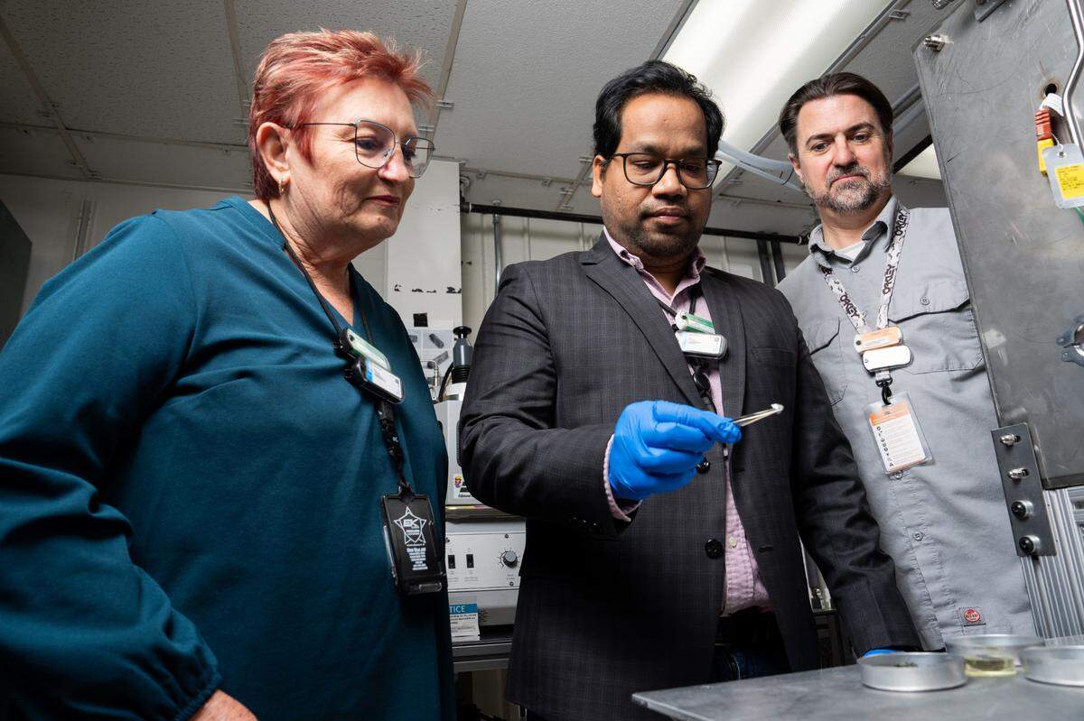Researchers (from left) Isabella van Rooyen, Subhashish Meher and Steven Livers are part of a team that combined PNNL’s expertise in engineering, computational science, materials science, chemistry, fabrication and microscopy to develop a modified alloy that replaces the critical material cobalt with manganese.
