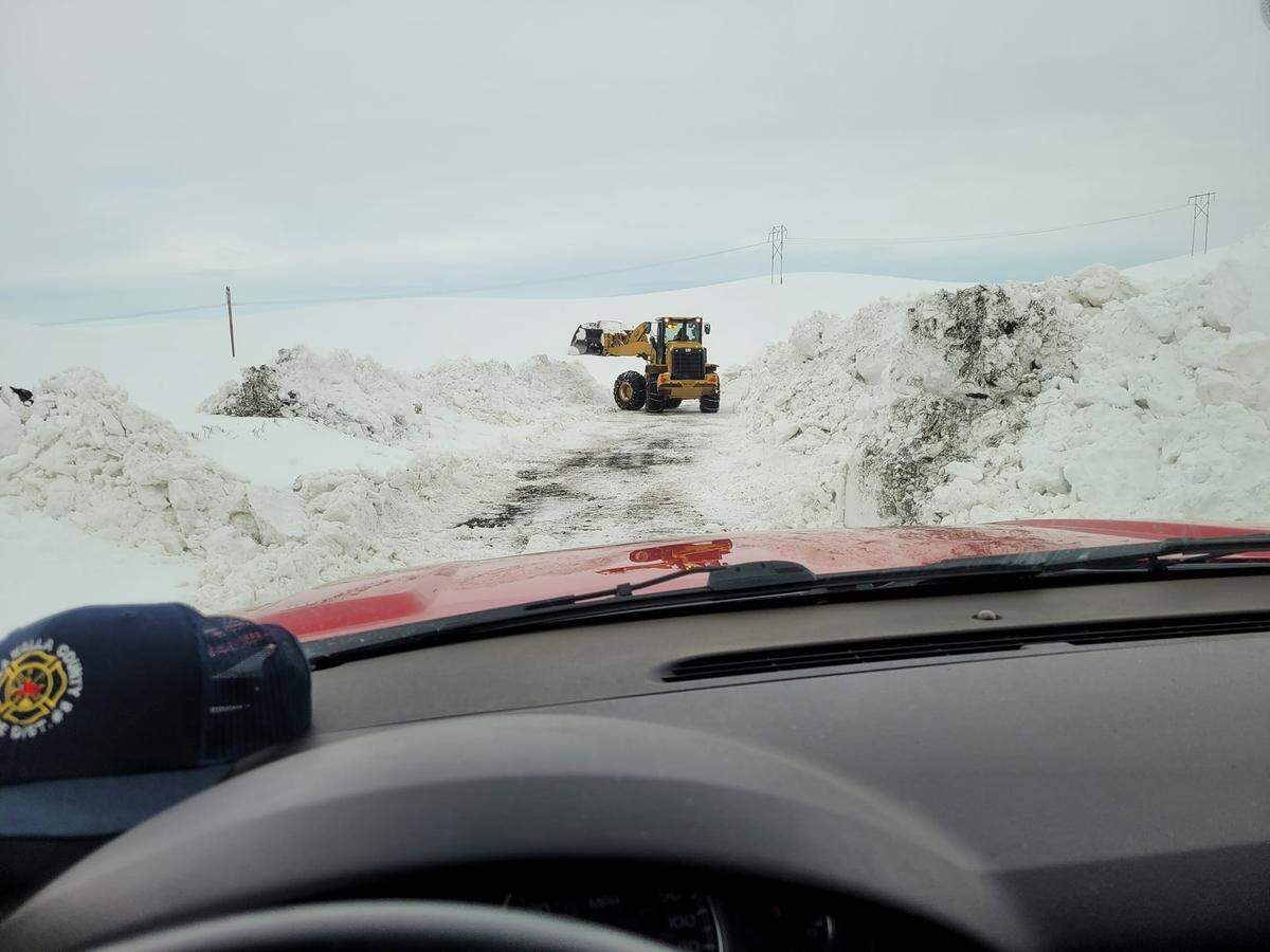 Walla Walla County Fire District 8 Chief Robert Clendaniel took this photo of the work being done by Walla Walla County Public Works employees to clear the impassable roads after this week’s drifting snow.