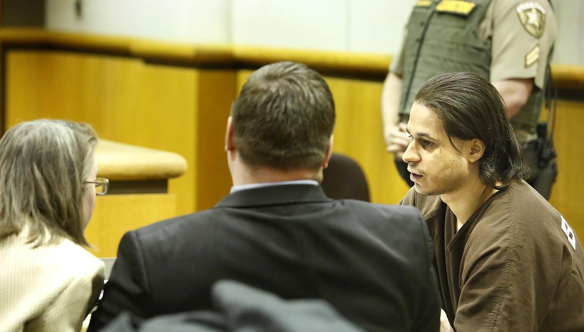 Murder suspect Stephen Morfin, right, talks with his defense attorneys Shelley Ajax, left, and Dennis Hanson before the start of a witness deposition for use in his second-degree murder trial in Benton County Superior Court. Watch videos at: tricityherald.com/video