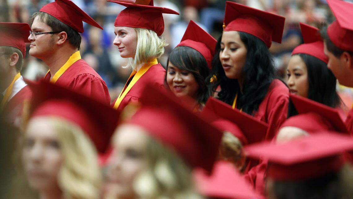 Two Kennewick teens are working to change a policy preventing military honor cords from being worn at Kennewick high school graduations. This was Kamiakin High's ceremony in 2016.