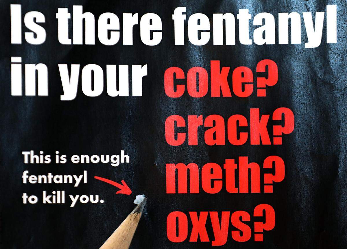 A poster at Merit Resource Services in Kennewick illustrates the small amount of fentanyl that can be lethal.