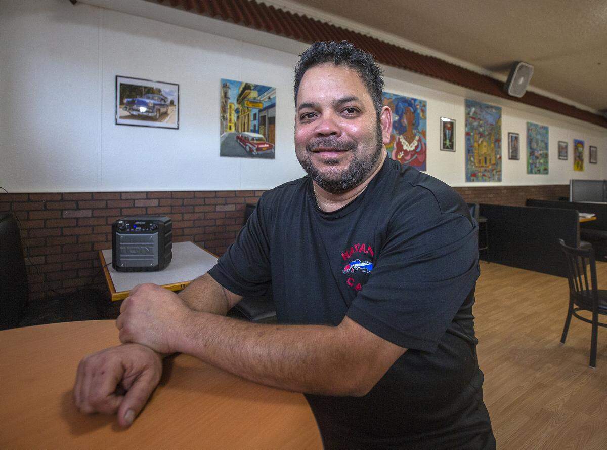 Leo Morales, pictured in 2019 inside Havana Cafe, said his Cuban restaurant is offering to serve free lunches to children age 10 and under who are out of school for the next six weeks. However, he still is trying to work out the logistics for how that food will be delivered.