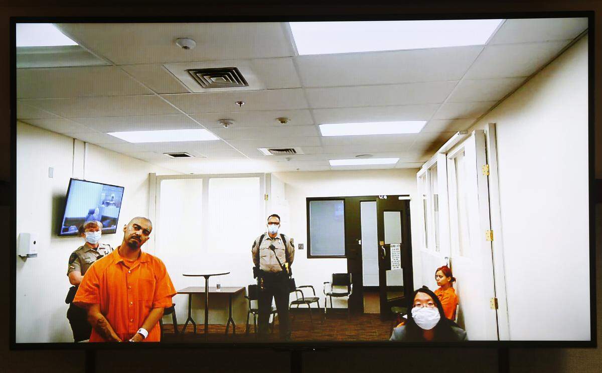 Ernesto Porfirio Gomez, 30, appears via a video in Franklin County Superior Court Monday with a provisional defense attorney after he was arrested Sunday on suspicion of 16 counts of second-degree rendering criminal assistance. The charges are in connection with two shootings, one of them deadly, at a Pasco home on East Lewis Street near Douglas Avenue.