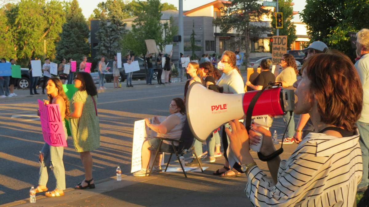 More than 400 people gathered along George Washington Way Friday evening to protest a U.S. Supreme Court decision that overturned Roe v. Wade.
