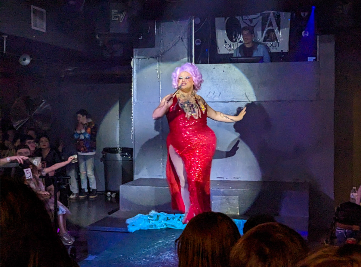 Drag queen Miss Sugar performs as the Fairy Godmother from “Shrek 2,” singing Bonnie Tyler’s “Holding Out For a Hero.” 