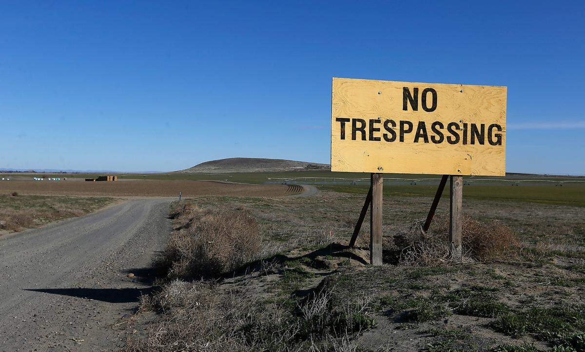 A No Trespassing sign for the Lewis and Clark Ranch stands on Ruppert Road near the intersection of Keene Road in West Richland.