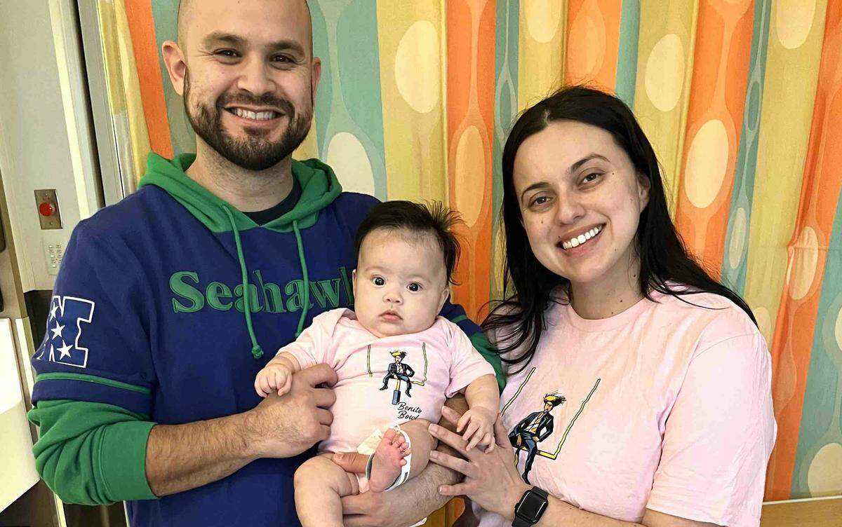 James and Lucia Sanchez of Pasco with their daughter, Lucia. Lucia has been diagnosed with a rare pediatric kidney cancer and is responding well to treatment.