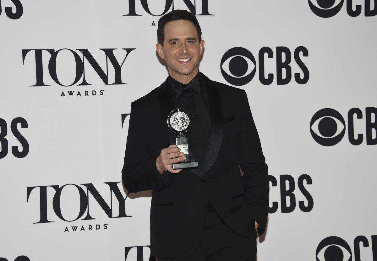 Santino Fontana poses in the press room with the award for best performance by an actor in a leading role in a musical for “Tootsie.”
