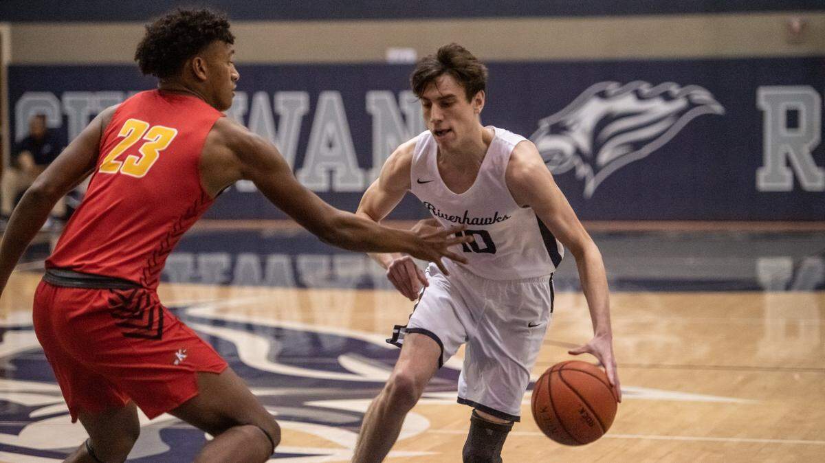 Chiawana senior guard Cooper DeWitt’s 3-point shot as time expired gave the Riverhawks the victory in the first round of the District 8 4A tournament.