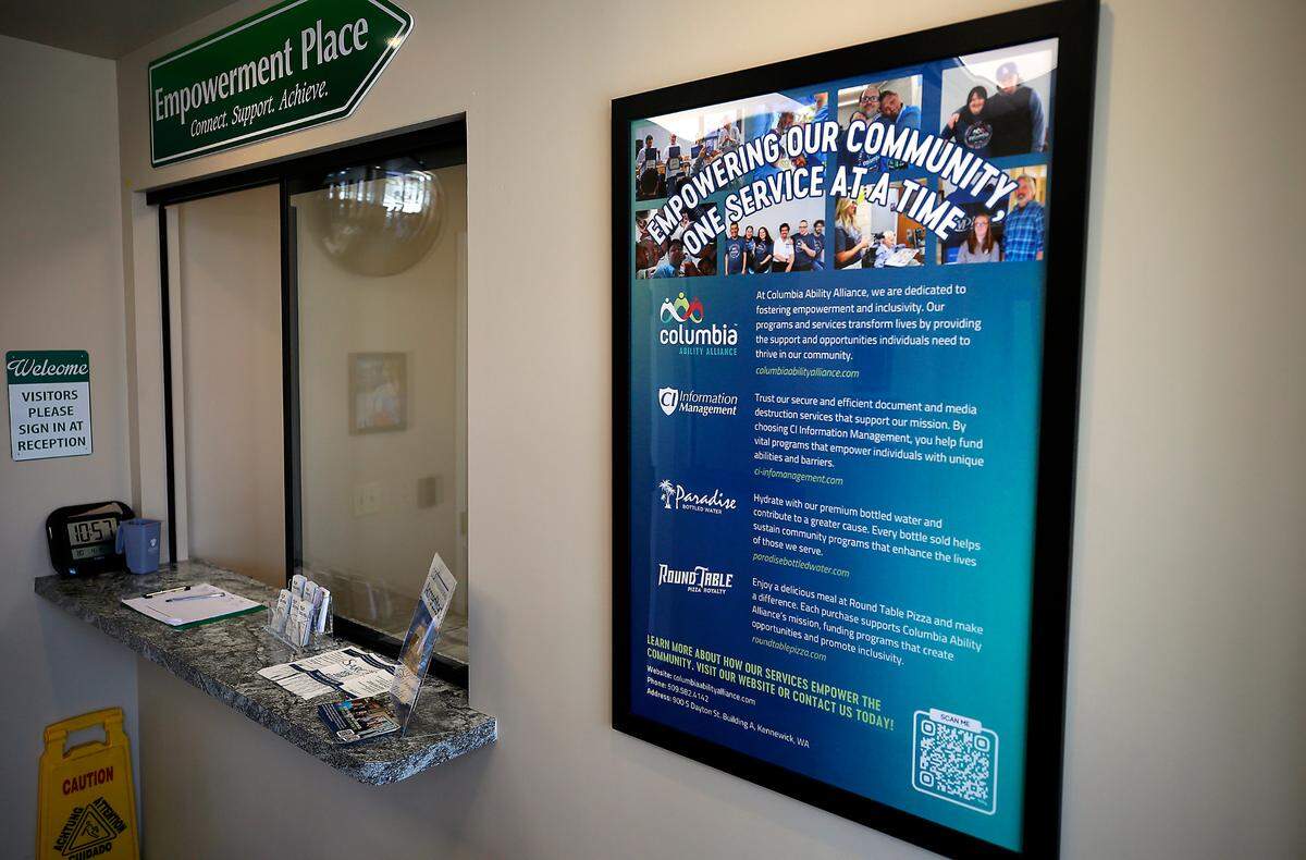 Signs on display about the programs and philosophy offered at the Columbia Ability Alliance in downtown Kennewick.