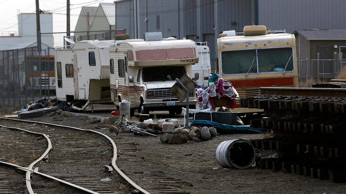 Apparently abandoned RVs sit on Railroad Avenue just east of North Fruitland Street in downtown Kennewick in February 2023