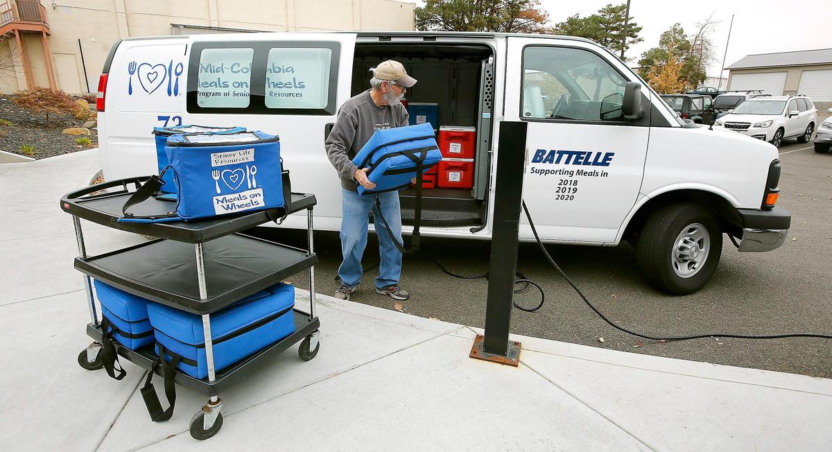 Volunteer Larry Nunn loads one of the Mic-Columbia Meals of Wheels delivery vans Thursday at their Fowler Street facility in Richland. Someone stole the non-profit’s 1998 van that was as a backup vehicle for delivering 600 hot meals to seniors living between Prosser and Pasco. Watch a video at: tricityherald.com/video