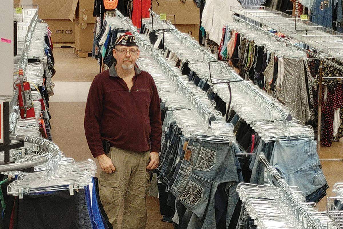 Thelbert M. “Thadd” Lawson Jr. stands in the Veterans Warehouse Thrift Store when it opened in 2021 in Kennewick.