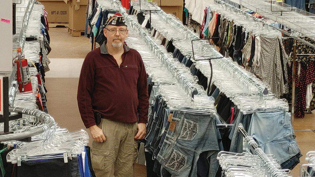 Thelbert M. “Thadd” Lawson Jr. stands in the Veterans Warehouse Thrift Store when it opened in 2021 in Kennewick. He’s accused of sexually harassing female employees, volunteers and shoppers at Tri-Cities and Wenatchee stores.