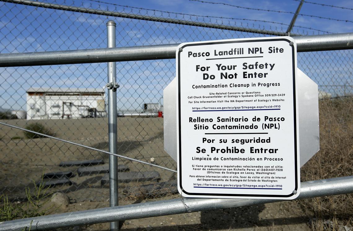 A sign attached to a gate at the Pasco Landfill on Dietrich Road north of Highway 12 near the Pasco-Kahlotus Highway warns people to not enter the contaminated area. The State of Washington Department of Ecology has scheduled a public meeting for evaluating final cleanup options for the site on 6;30 p.m. on September 26 at Virgie Robinson Elementary School in Pasco. Watch a video at: tricityherald.com/video
